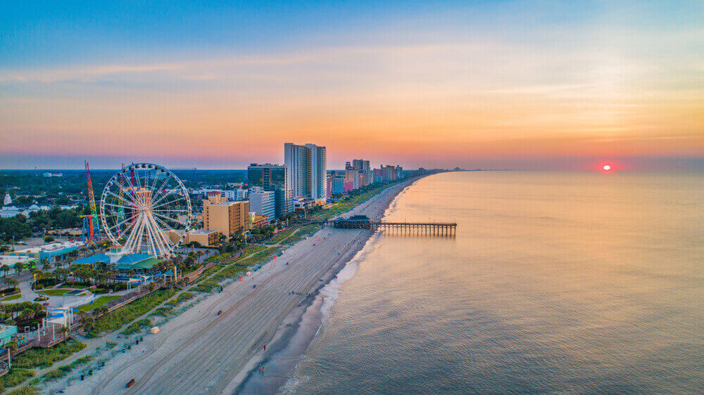 A scenic view of Myrtle Beach, South Carolina with its beautiful coastline and clear blue waters.