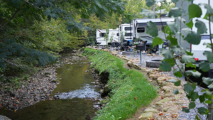 RV campsites along the creek at Dudley Creek RV Resort in Gatlinburg