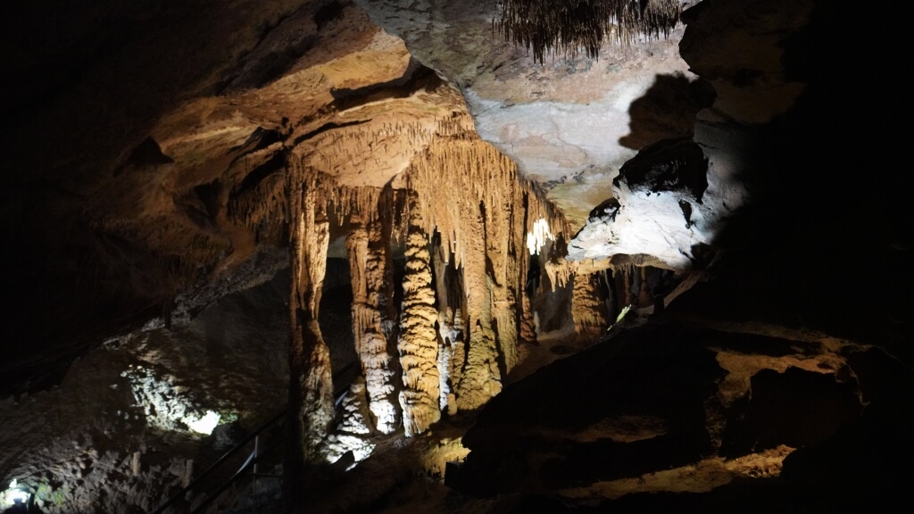 Stalactites and stalagmites inside Tuckaleechee Caverns in the Smoky Mountains.