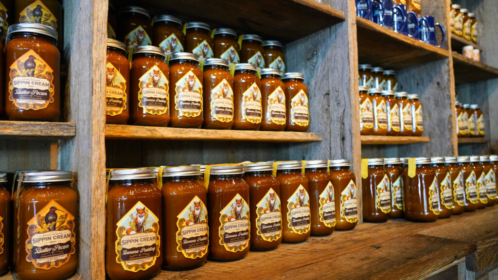 Shelves of Sugarlands Appalachian Sippin’ Cream flavors in Gatlinburg