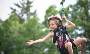 Child ziplining through the Smoky Mountains