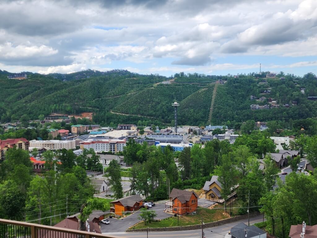 View of Gatlinburg surrounded by the Smoky Mountains on a cloudy day