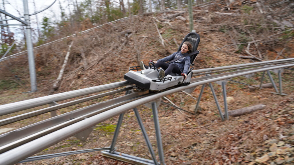 Rider on Ripley’s Mountain Coaster in Gatlinburg during a Smoky Mountains adventure