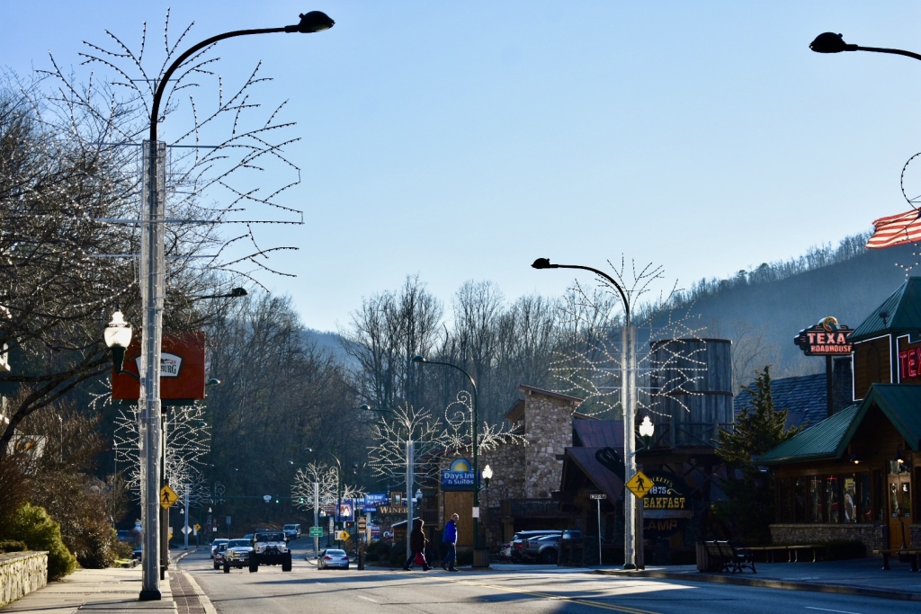 Downtown Gatlinburg Parkway lined with Winter Magic holiday light decorations on the lamp posts.